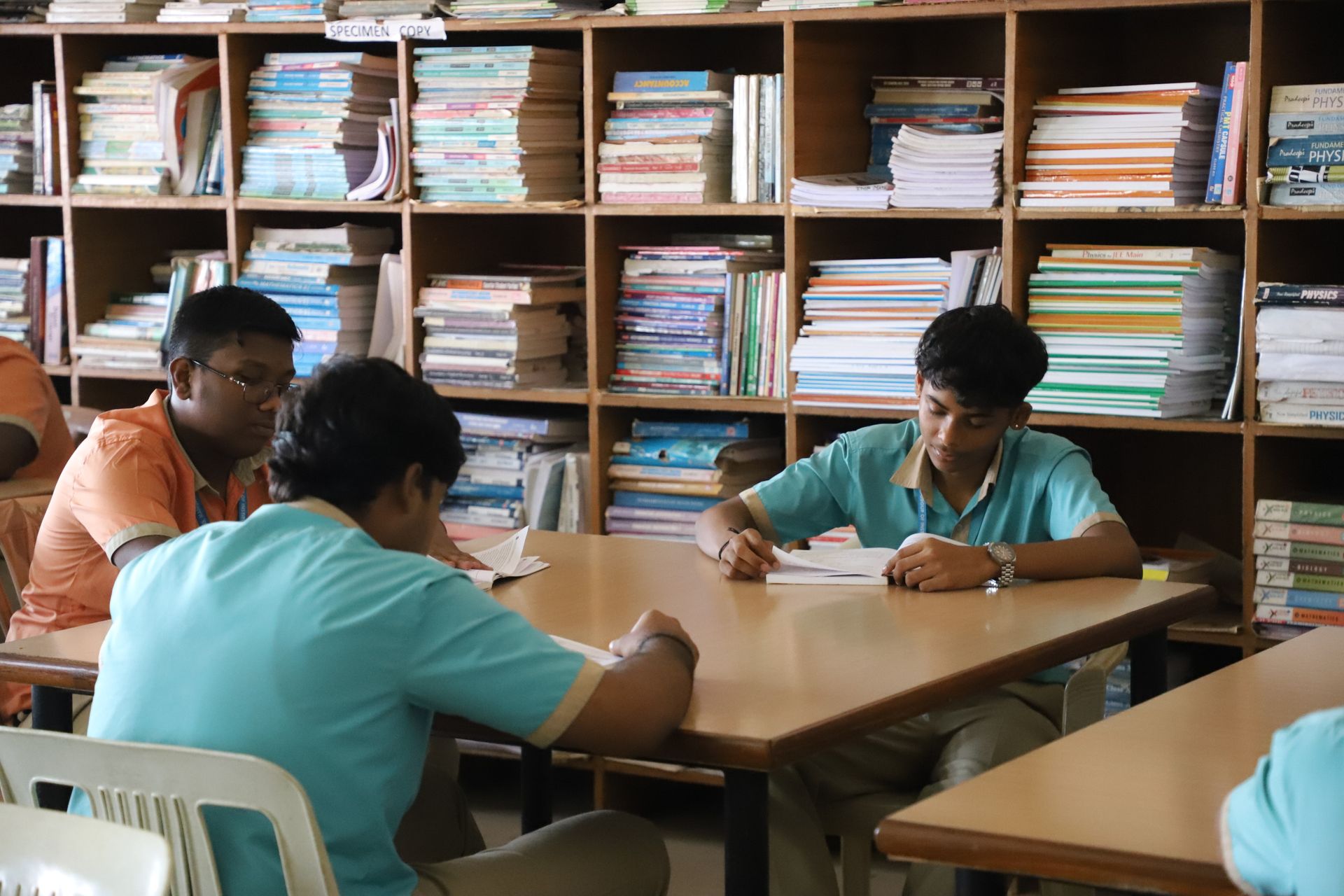 Students studying together in the college library