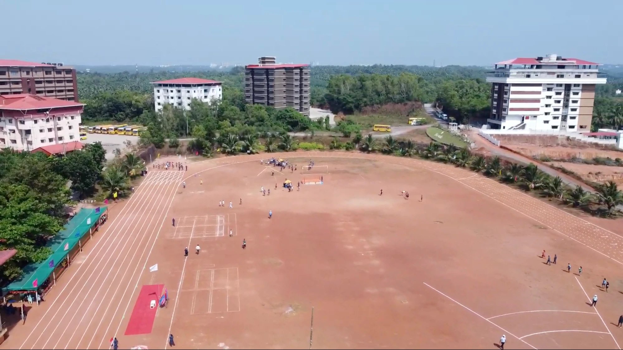 Students on the campus sports ground and running track