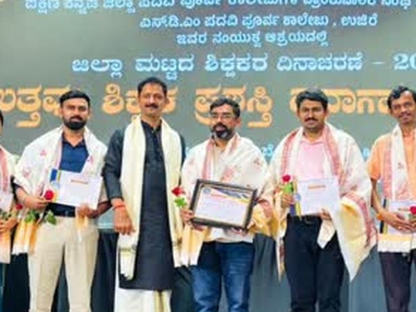SVPU receives the 100% Result Award at the DK PUC Teachers&rsquo; Day celebration