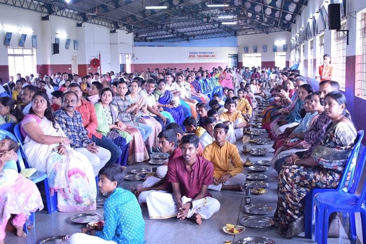 Students and parents seated together at the Jyothi Pradana farewell