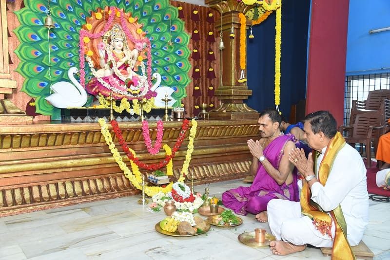 Navaratri pooja before the decorated Sharada idol